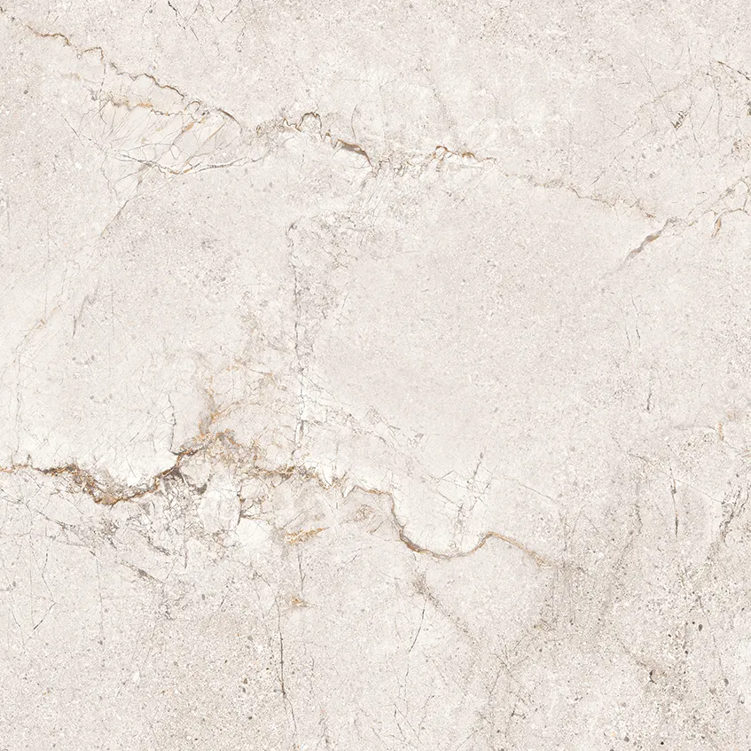 Beige stone-effect porcelain tile with bold fractured veining and golden undertones