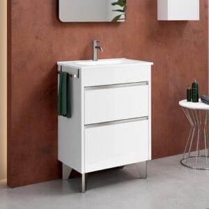 White gloss two-drawer freestanding vanity unit with chrome bar handles and white basin